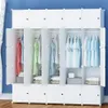 A modular wardrobe with multiple compartments, some open to display clothes, set against a blue wall. Anteprima dell’immagine prodotto