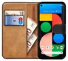 A book-style phone case with a Google Pixel 5 phone inside, showing cards and cash in the case. Anteprima dell’immagine prodotto