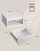 Diagrams showing the dimensions of a white drawer and a white storage unit, with a weight limit indicated. Produktbild-Vorschau