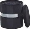 A black velvet storage ottoman with a silver band and its lid slightly ajar, set against a white background. Náhled obrázku produktu
