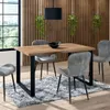 A dining room scene with a table and chairs. Produktbild-Vorschau
