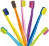 A collection of colorful toothbrushes arranged in a fan shape against a white background. Náhled obrázku produktu