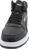 A close-up, front-facing view of a black Puma high-top sneaker with white accents. Podgląd zdjęcia produktu