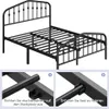 A black metal bed frame with a crown motif headboard is shown against a white background. Two close-up insets illustrate assembly steps. Podgląd zdjęcia produktu