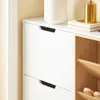 A close-up view of a white shoe cabinet with wooden shelves. Náhľad obrázku produktu