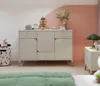 A child's room with a dresser, toy bin, and decorative elements. Produktbild-Vorschau