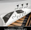 A close-up view of a mattress protector, showing its texture and a label, with arrows indicating airflow over a wooden bed frame. Produktbild-Vorschau