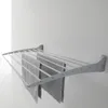 A gray wall-mounted drying rack with two gray towels hanging on it. Produktbild-Vorschau