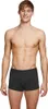 A man wearing black boxer shorts against a white background. Produktbild-Vorschau