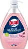 A bottle of pink liquid dish soap with a pump dispenser. Náhled obrázku produktu