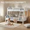 A child playing with blocks in front of a white bunk bed in a room with mountain-themed wall art. Náhľad obrázku produktu