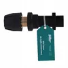 A black and brass pressure washer lance adapter with a teal tag attached. Voir les images du produit