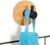 Crochet de suspension autocollant en bois et métal noir Voir les images du produit 2