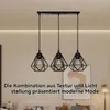 A modern living room with a sofa and a pendant light fixture. Produktbild-Vorschau