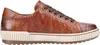A side view of a brown leather sneaker against a white background. Produktbild-Vorschau