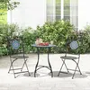 A bistro set with a mosaic table and two chairs on a patio, surrounded by greenery. Produktbild-Vorschau