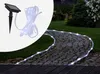 A solar-powered LED light strip is shown both as a product shot and installed along a garden path. Produktbild-Vorschau