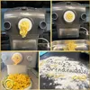 A collage of images showing a Philips pasta maker creating fresh pasta, with a plate of finished pasta and a close-up of pasta being made on a black surface with flour. Produktbild-Vorschau