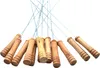 A group of wooden grill skewers with light blue strings against a white background. Produktbild-Vorschau