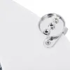 A close-up view of a metal mounting bracket with screws attached to a white surface. Anteprima dell’immagine prodotto