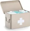 A beige metal first aid box with its lid open, showing medical supplies inside. A white cross symbol is visible on the front of the box. Náhled obrázku produktu