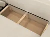 Close-up view of the interior storage compartments of a beige corduroy sofa. Náhled obrázku produktu