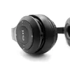 Close-up of a black headphone earcup with control buttons. Náhled obrázku produktu