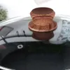 Close-up of a wooden handle on a glass pot lid. Náhled obrázku produktu
