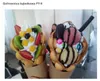 Two bubble waffles filled with ice cream and fruit toppings. Podgląd zdjęcia produktu