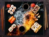 A collage of sushi, fire, and water elements. Produktbild-Vorschau