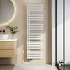 A modern bathroom setting with a white towel radiator, a wooden vanity, and a round mirror. Produktbild-Vorschau