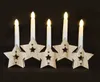 A wooden candle holder with five LED candles against a black background. Voir les images du produit