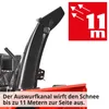 Close-up of a snow blower's discharge chute with a marketing graphic indicating its throwing distance. Produktbild-Vorschau