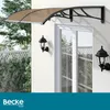 An awning over a door with two wall lamps on either side. Náhled obrázku produktu