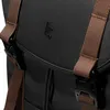 A close-up view of a black backpack with brown straps and black buckles. Produktbild-Vorschau