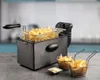 A deep fryer with french fries. Produktbild-Vorschau