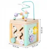 A wooden educational cube toy with various interactive elements. Náhľad obrázku produktu