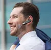 A man wearing a white shirt and a blue jacket over his shoulder, smiling while wearing a Bluetooth headset. Produktbild-Vorschau