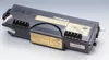 A black toner cartridge is shown on a light gray surface. Náhľad obrázku produktu