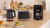 A Bosch kettle, toaster, and coffee maker are displayed on a kitchen counter. Podgląd zdjęcia produktu