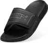 A black Puma slide sandal is shown against a white background. Produktbild-Vorschau