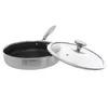 A stainless steel frying pan with a honeycomb pattern inside and a clear glass lid with a silver handle, shown on a white background. Náhled obrázku produktu