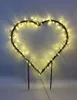 A heart-shaped outdoor Christmas decoration with warm white LED lights. Produktbild-Vorschau