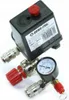 A black pressure switch with a pressure gauge and red adjustment knob, attached to various metal fittings, is shown against a white background. Produktbild-Vorschau
