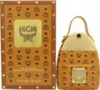A product shot of MCM Eau de Parfum and its packaging. Anteprima dell’immagine prodotto