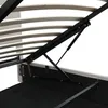 A close-up view of the internal mechanism of a bed frame, showing the gas struts and wooden slats. Náhled obrázku produktu