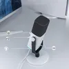 A white and black FIFINE AM8 USB/XLR gaming microphone is shown on a desk next to a computer monitor. Náhled obrázku produktu