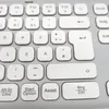 A close-up view of a white keyboard. Anteprima dell’immagine prodotto