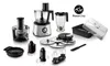 A collection of food processor attachments and accessories, including blades, beaters, a juicer attachment, and a blender jug, arranged around two food processor bases, with a logo and text 'PowerChop' at the top right. Náhľad obrázku produktu