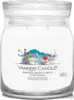 A Yankee Candle jar with a festive holiday-themed label. Podgląd zdjęcia produktu